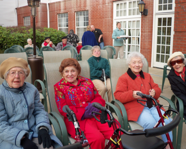 arbors senior living residents at outdoor event