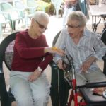 senior residents with butterfly