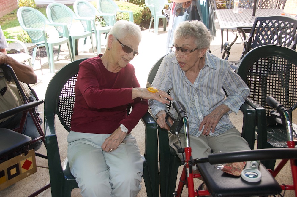 senior residents with butterfly