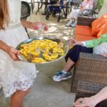 senior residents with butterflies on orange slices