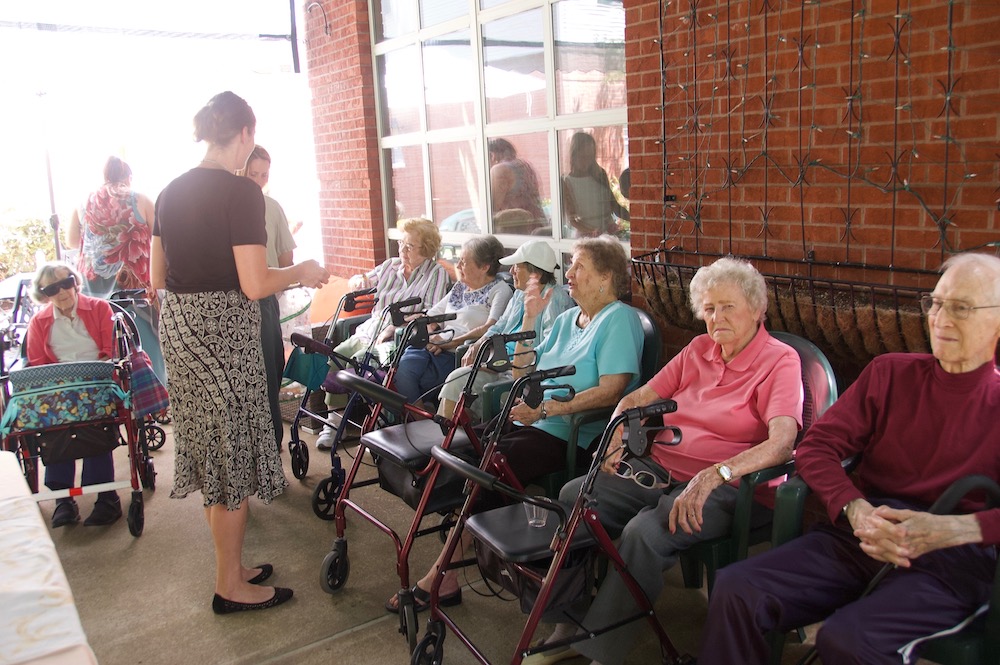 senior residents at butterfly release event