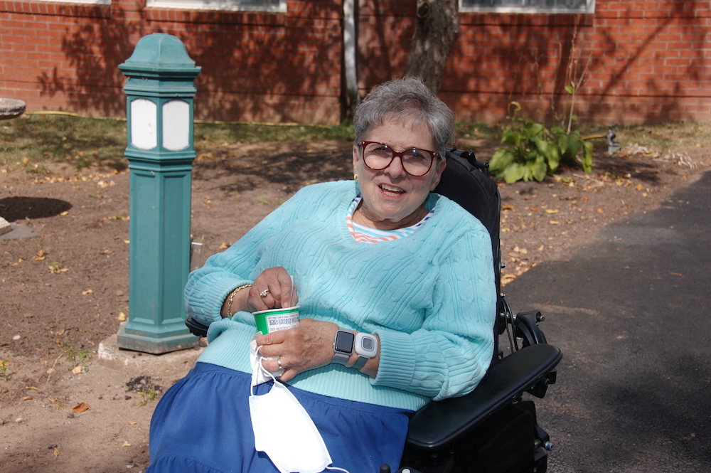 senior resident enjoying kona ice