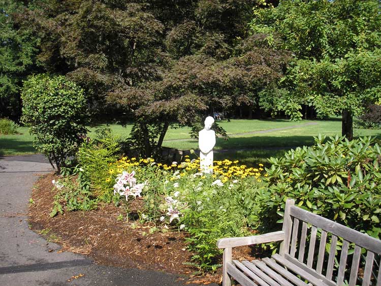 statue along arbors outdoor walkway